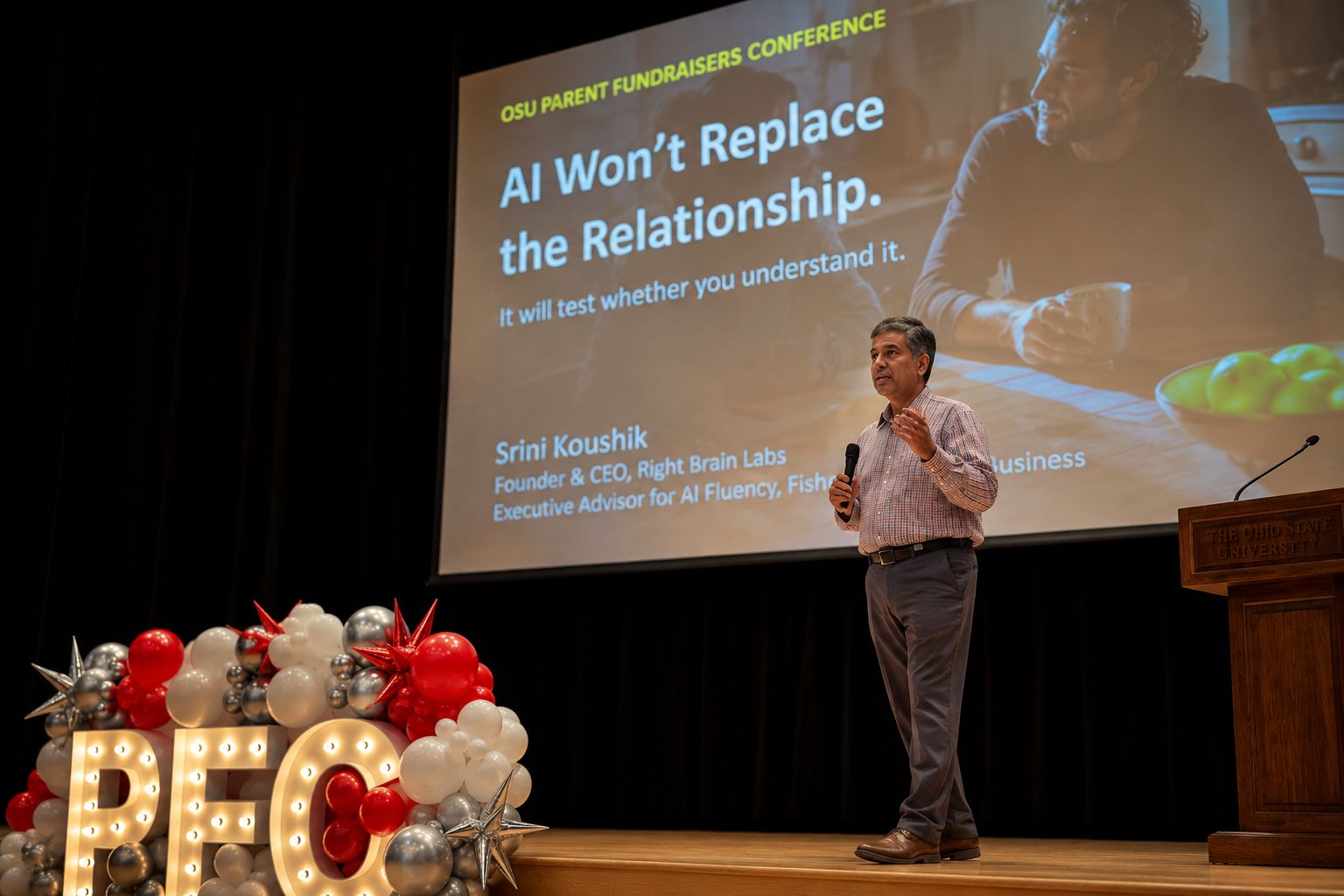 Srini Koushik giving a keynote on stage at the OSU Parent Fundraisers Conference